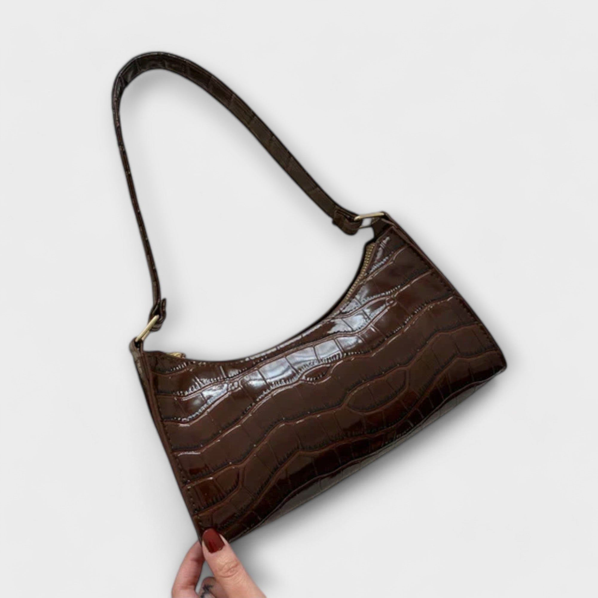Leather Bag, Glossy Finish, Spacious Interior, Comfortable Handles, Versatile Design