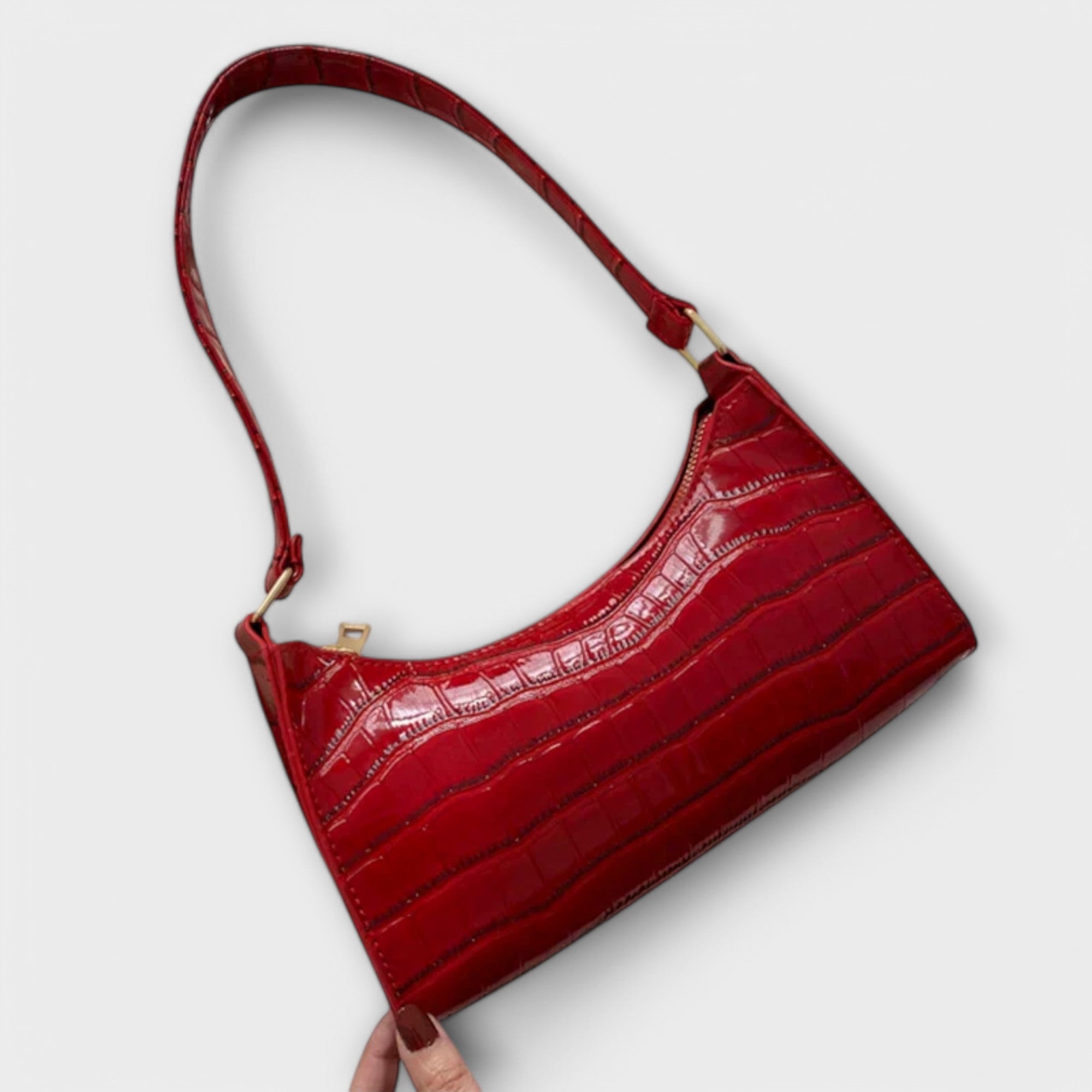 Leather Bag, Glossy Finish, Spacious Interior, Comfortable Handles, Versatile Design