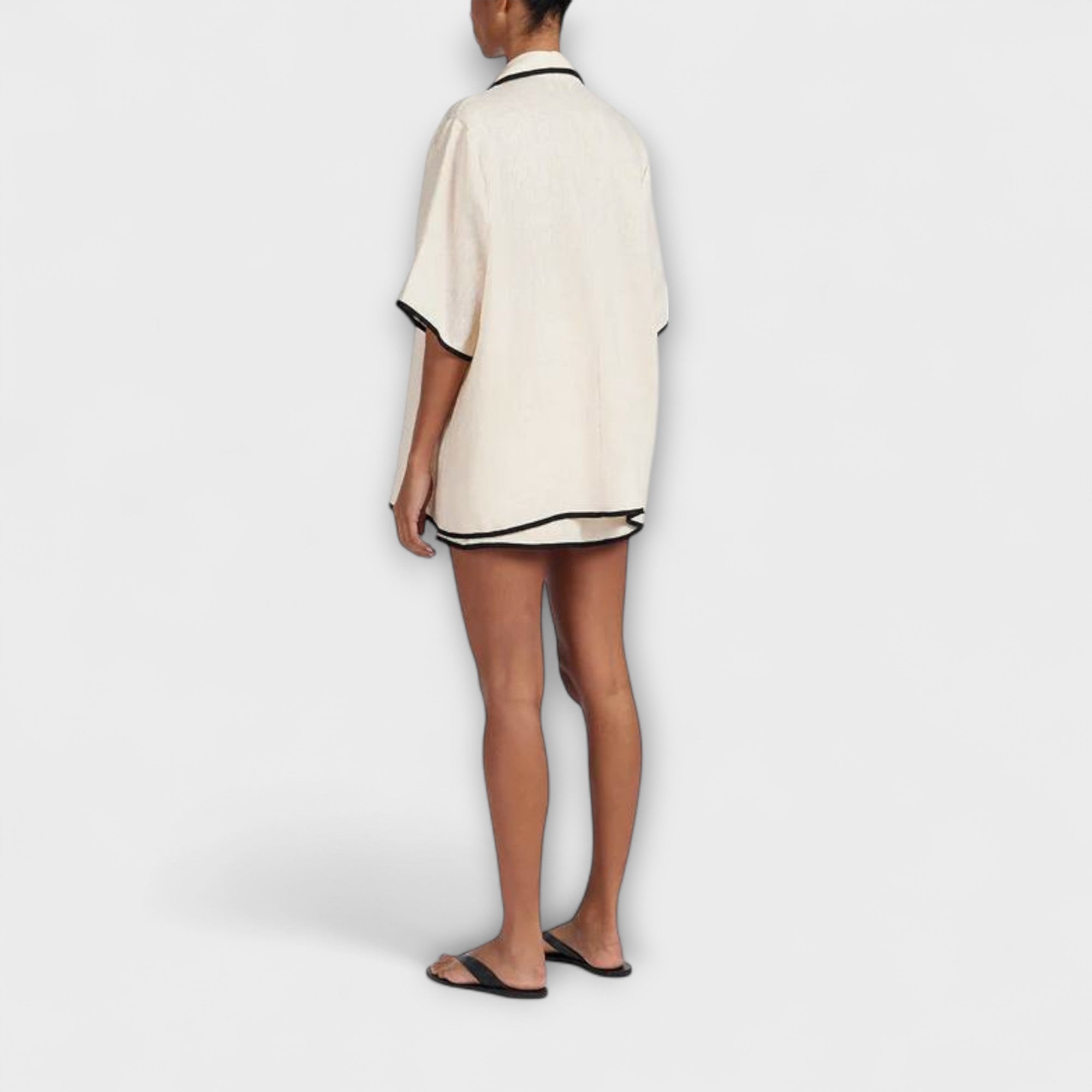 Women’s Skirt Set, Short Sleeve V-Neck Top with Relaxed Fit and Coordinating Skirt, Modern Contrast Accents, Double Closure