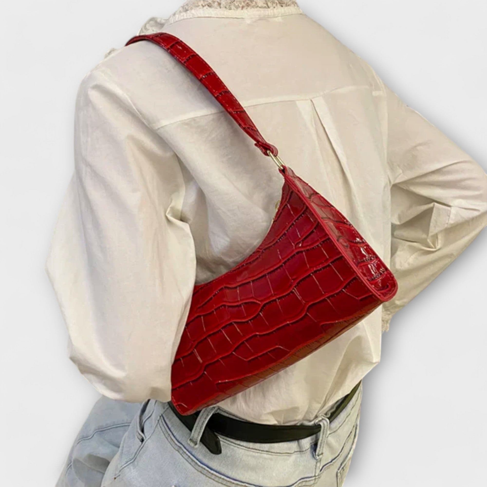 Leather Bag, Glossy Finish, Spacious Interior, Comfortable Handles, Versatile Design